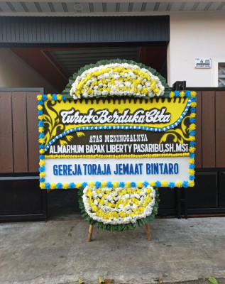 Papan Bunga Duka di Sewu